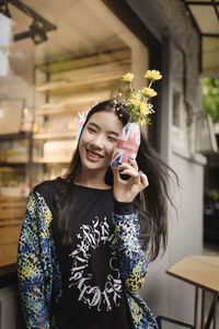 Portrait of smiling young woman