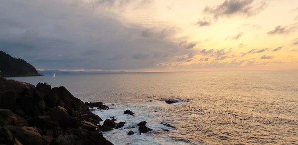 Scenic view of sea against sky during sunset