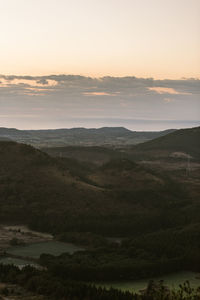 Scenic view of landscape against sky during sunset