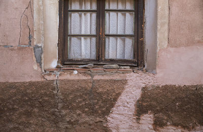 Closed window of old building