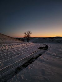 View of road against sky during sunset