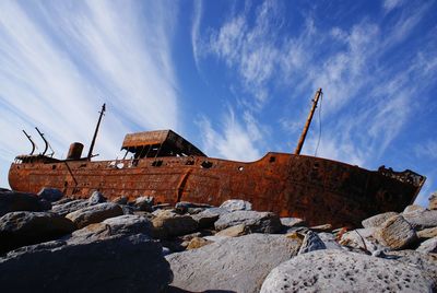 View of damaged building against sky