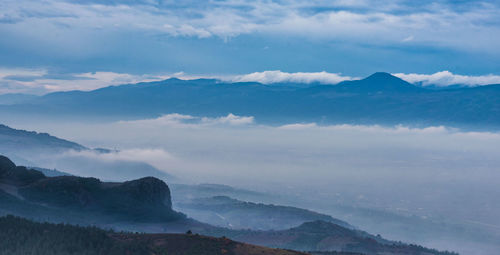 Scenic view of mountains against sky