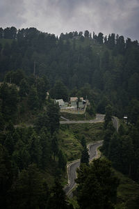 High angle view of trees and buildings against sky