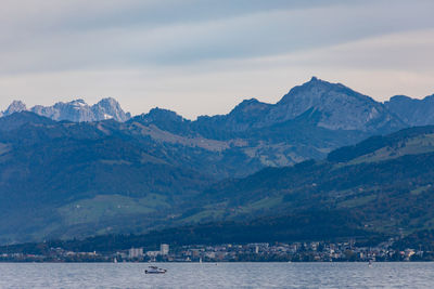 Scenic view of snowcapped mountains against sky