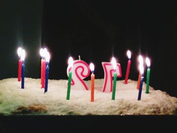 Close-up of candles on birthday cake