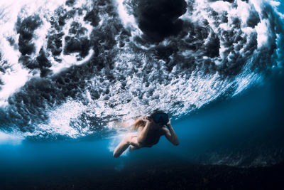 Man swimming in sea