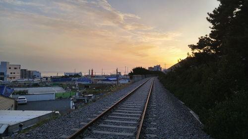 Railroad track at sunset