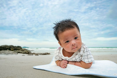 Portrait of cute boy on beach