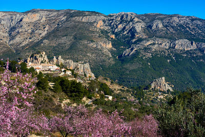 Distant view of castell de guadalest against mountains