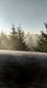 Scenic view of snow covered land against clear sky