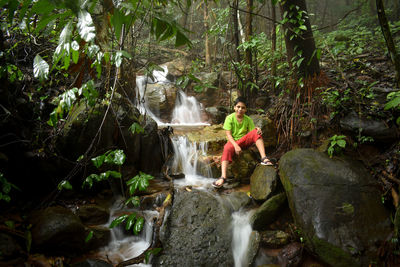 Scenic view of waterfall in forest