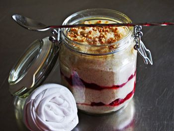 High angle view of dessert in jar on table