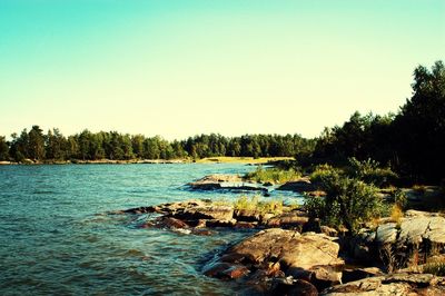 Scenic view of calm sea against clear sky