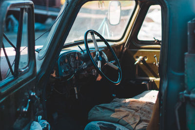 Open door of pick-up truck on road