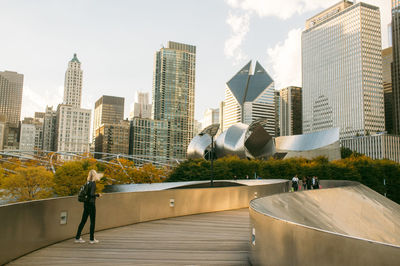 Woman looking at city skyline