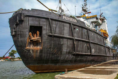 Ship in water against sky