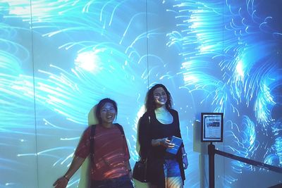 Young woman looking at music concert