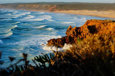 Wavy day at bordeira beach in carrapateira, algarve, portugal 