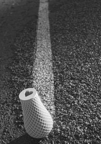 High angle view of skateboard on road