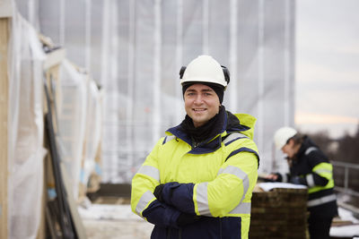 Engineer standing at building site