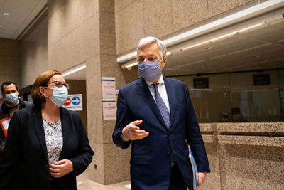 Group of people standing in front of office