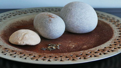 Close-up of bread in plate on table