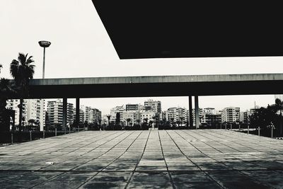 Street amidst buildings against sky