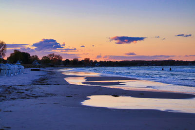 Scenic view of beach during sunset