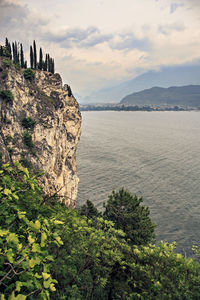 Scenic view of rocks and mountains against sky