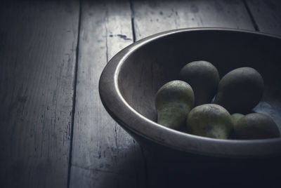 High angle view of fruits in bowl on table