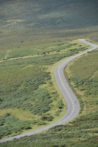 High angle view of road passing through land