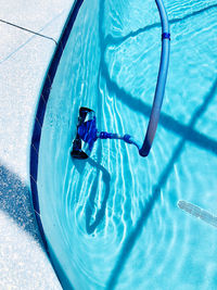 High angle view of person swimming in pool