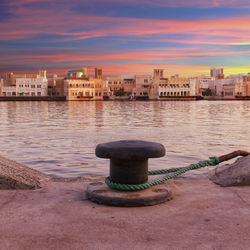 View of river in city against sky