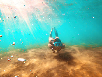 Man swimming in sea