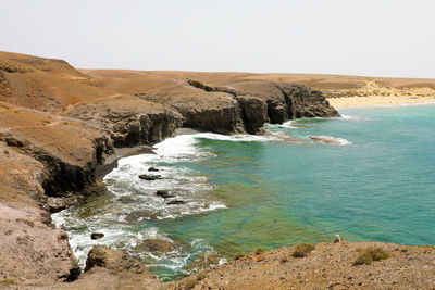 Scenic view of sea against clear sky