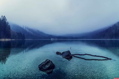 Scenic view of lake at night