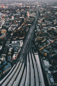 Aerial view of elevated road amidst buildings in city