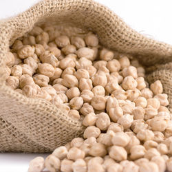 Close-up of chick-peas in sack