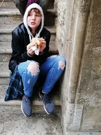 Portrait of a teenage girl holding ice cream