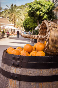 Close-up of orange fruits in basket