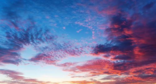 Low angle view of dramatic sky during sunset