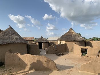 Built structure on beach against sky