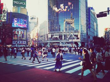 People walking on city street