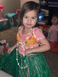 Portrait of cute smiling girl in traditional clothing