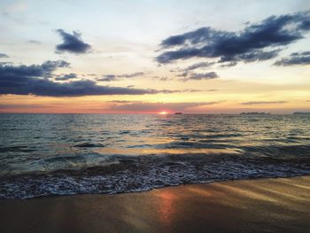 Scenic view of sea at sunset