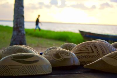 Close-up of mannequin on beach
