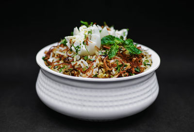 Close-up of salad in bowl on table