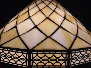 Low angle view of illuminated lamp