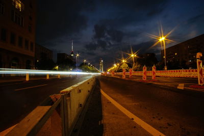 Light trails on street in city at night